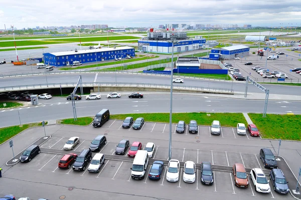 Aerial view of airport auto crowded parking lot in Pulkovo International airport in Saint-Petersburg, Russia