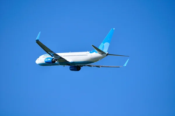 Pobeda Airlines Boeing 737 Next Gen airplane is flying above after departure from Pulkovo International airport in Saint-Petersburg, Russia