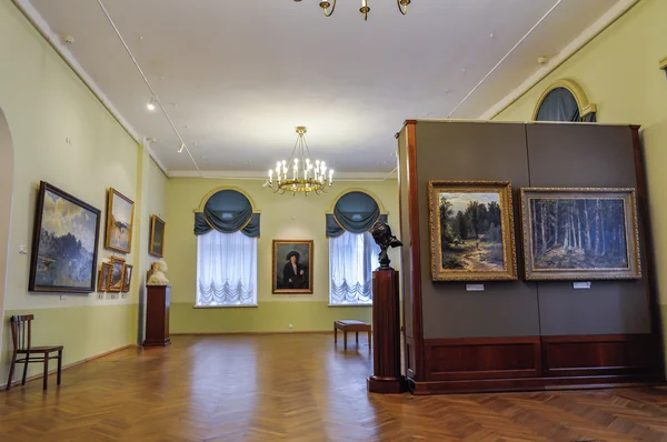 Interior of the Art Museum with sculptures and pictures hanging on the walls in the Art Museum of Veliky Novgorod, Russia