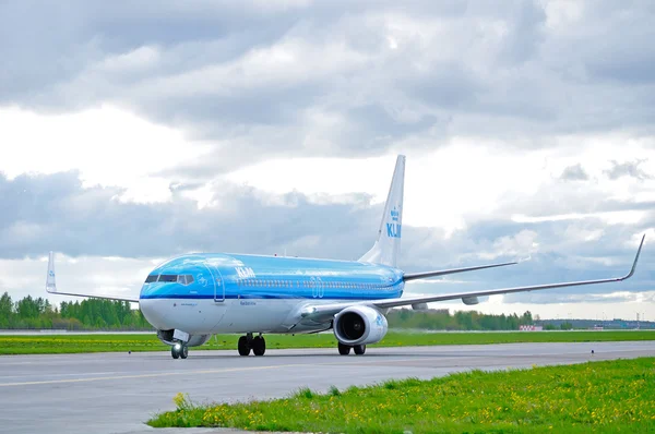 KLM Royal Dutch Airlines Boeing 737 Next Gen airplane rides on the runway after arriving at Pulkovo International airport in Saint-Petersburg, Russia