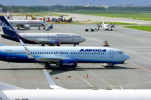 Aircrafts at the parking in Pulkovo International airport in Saint-Petersburg, Russia