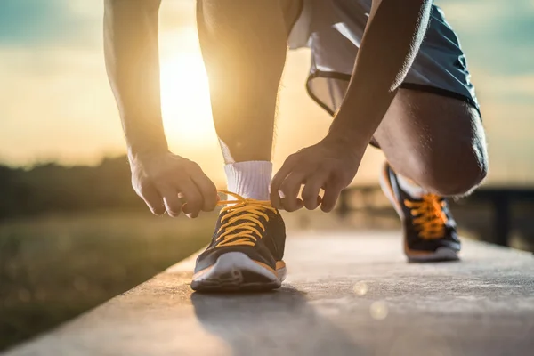 Close up shot of runner\'s shoes