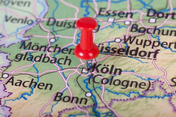 Close up of Cologne map with red pin - Travel concept
