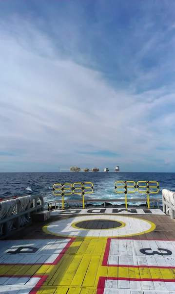 Oil and gas production platform from crew boat