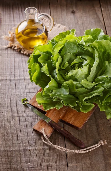 Butter lettuce over wooden rustic table