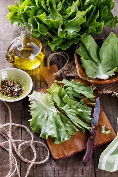 Butter lettuce over wooden rustic background