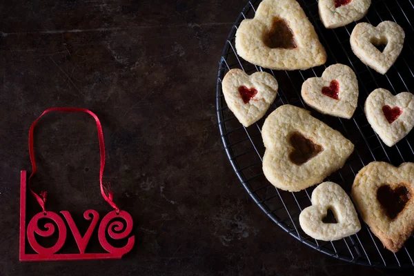 Homemade Heart Cookies from Above, Dark Background