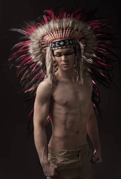 Indian strong man with traditional native american make up - Stock Image -  Everypixel