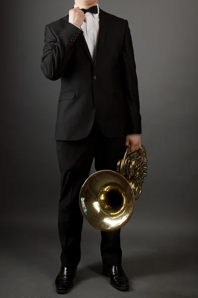 A man and the French horn