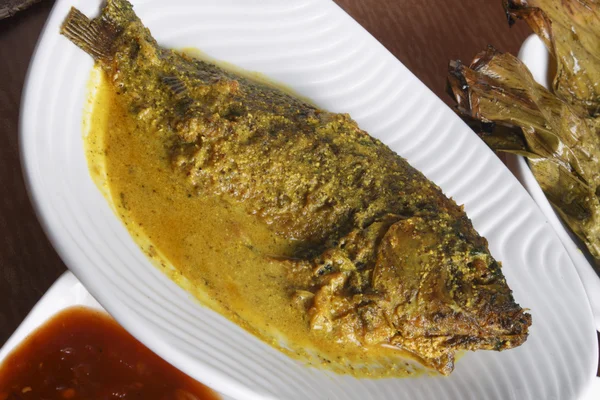 Maacher jhol - a Bengali Fish Curry