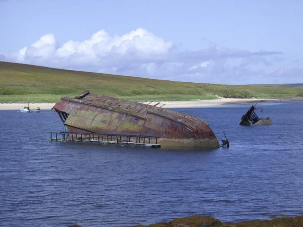 Old shipwreck in the Churchill barriers, Orkney, Scotland
