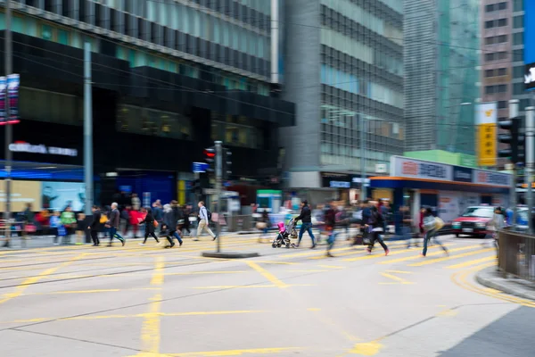 Pedestrians in business district of the City