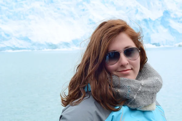 Close up of young woman at glacier in the Patagonia Argentina.
