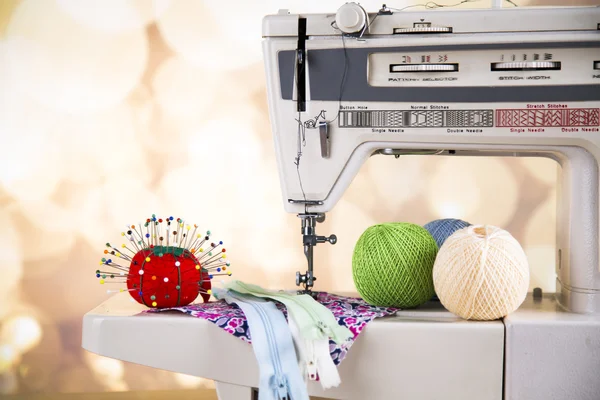 Sewing accessories on wooden table