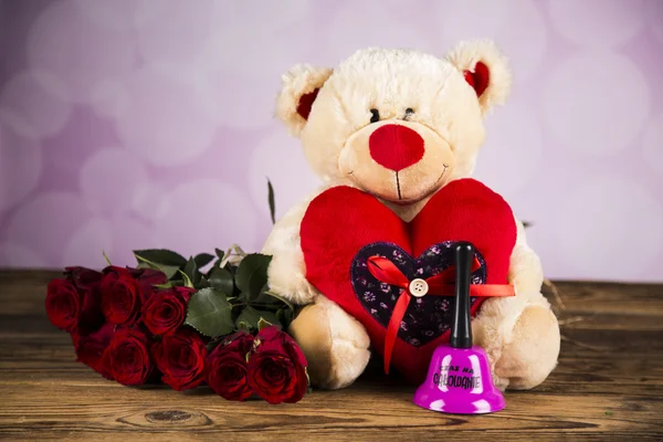 Day of love, Valentine's Day, roses and a teddy bear.