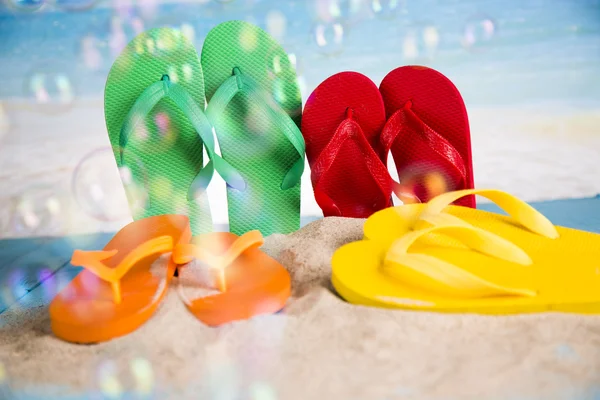 Vacation, sand, colorful molds for the sandbox, flip-flops colorful shells, the belt for swimming