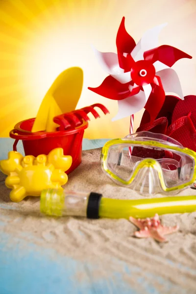 Vacation, sand, colorful molds for the sandbox, flip-flops colorful shells, the belt for swimming