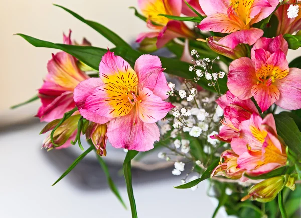 Flowers bouquet pink alstroemeria arrange for decoration in home, selective focus