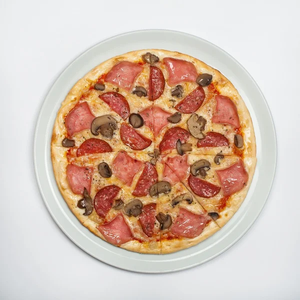 Pizza with salami and mushrooms