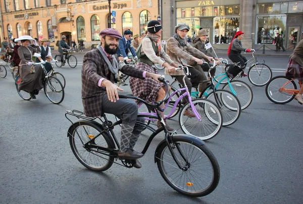 People riding bikes during Tweed Run