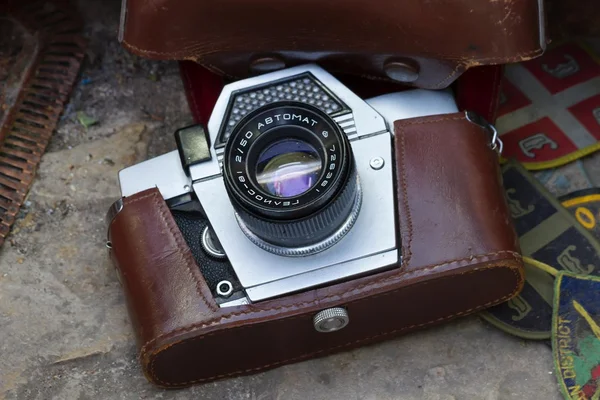 Old camera in brown case