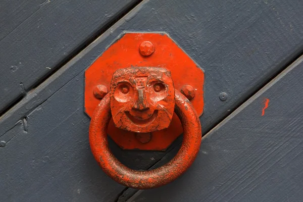 Orange door knocker