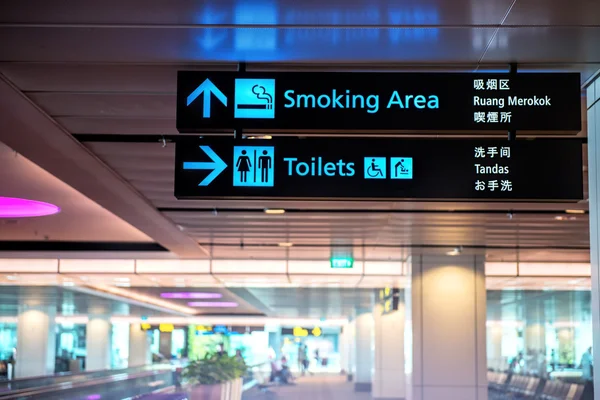 Smoking area zone signs in airport