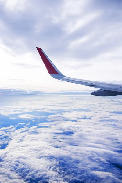 Wing of  airplane in sky