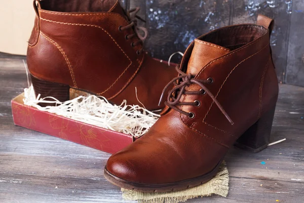 Boots, brown, female, wooden table, box of straw leather laces