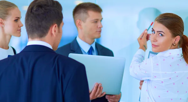 Group of  business people doing presentation with laptop during meeting