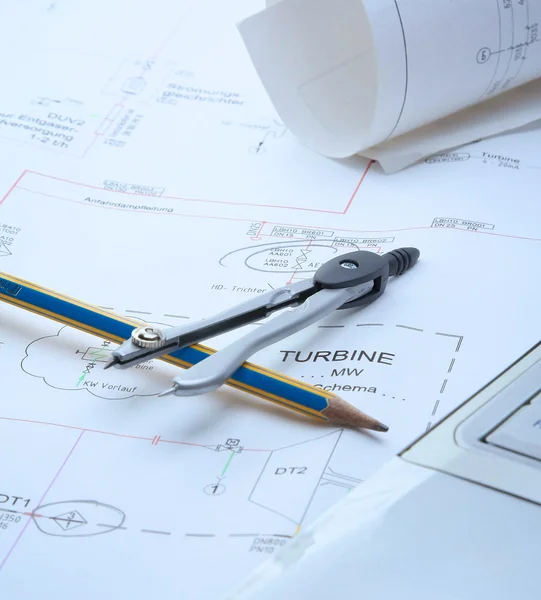 Architecture blueprint and tools on the desk