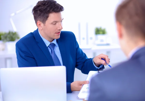 Business people working with laptop in an office