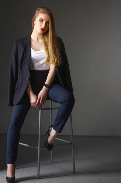 Young woman sitting on a chair