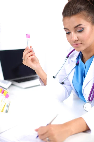 Woman researcher is surrounded by medical vials and flasks, isolated on white background