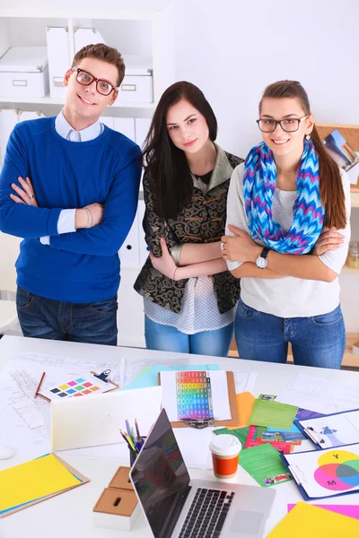 Young business people working at office on new project