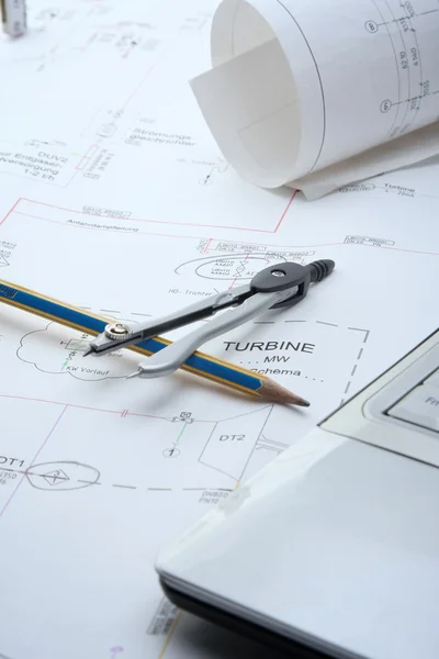 Architecture blueprint and tools on the desk