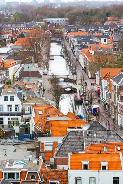 Aerial panoramic street view with canal and houses in Delft, Holland