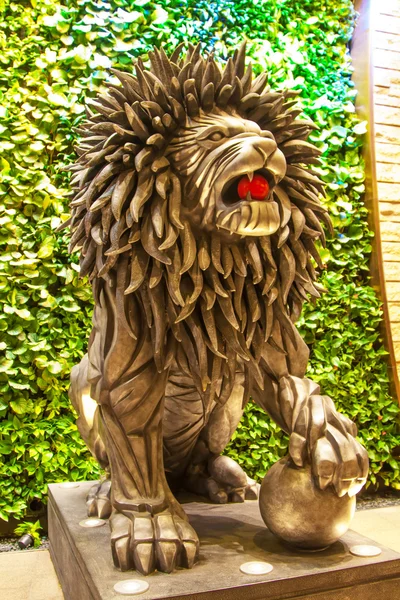 Lion statue near the entrance to City of dreams Casino, in Macau