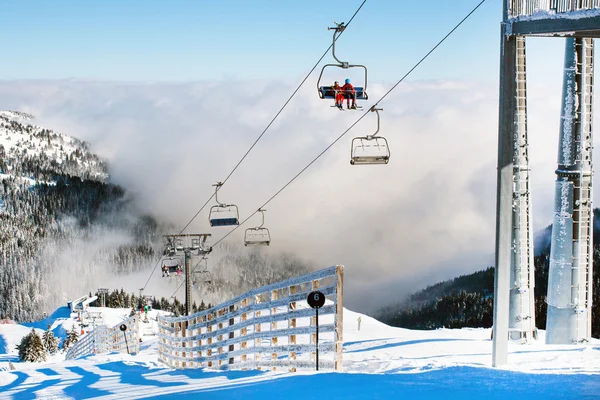 Ski resort Kopaonik, Serbia, ski lift, mountain view, fog