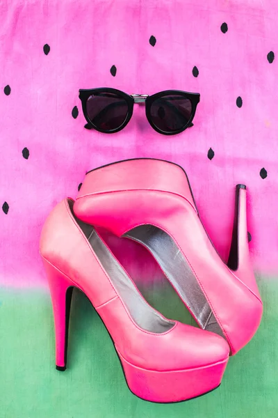 Woman accessories hight heels and sunglasses