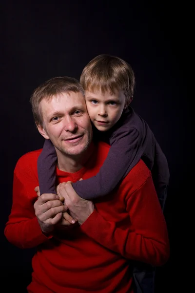 portrait of a father with his son