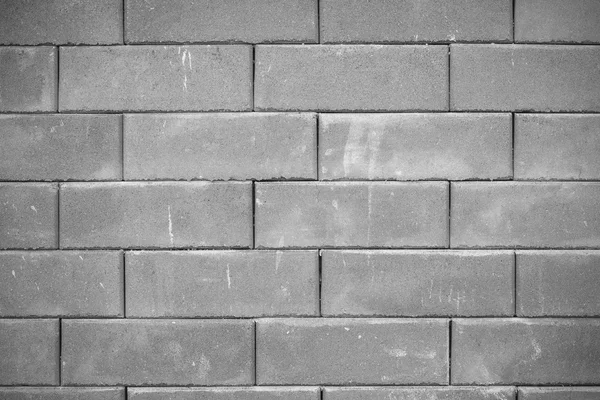 Closeup of old black and white brick wall texture, black and whi