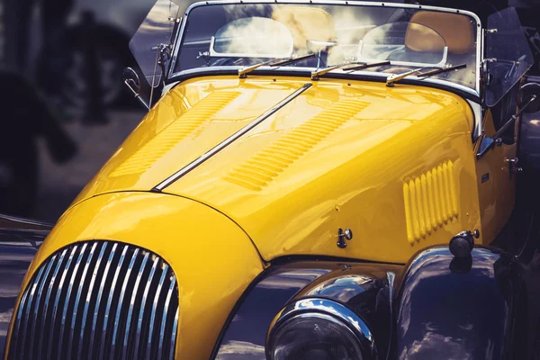 Vintage yellow and blue retro automobile