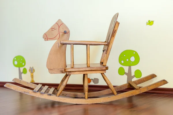 Wooden horse  in a child\'s bedroom