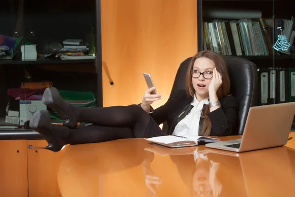 Office beautiful lady making selfie