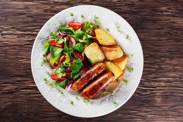 Roasted Sausages with Chips and Mix Vegetable salad