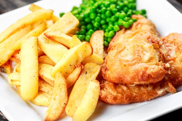 British Traditional Fish and chips with peas