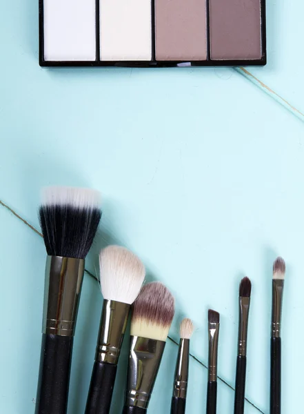 Set of makeup brushes and highlighter