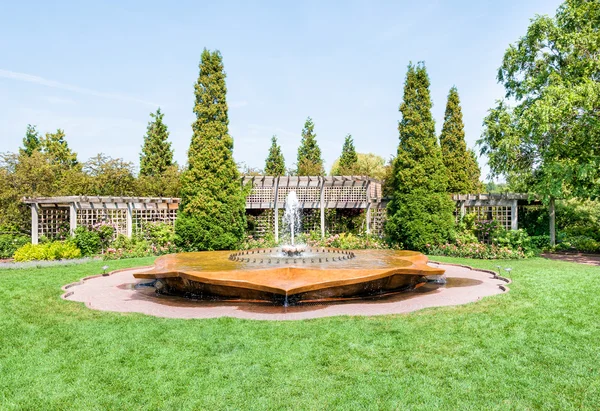 Fountain in the rose garden of Chicago Botanic Garden.