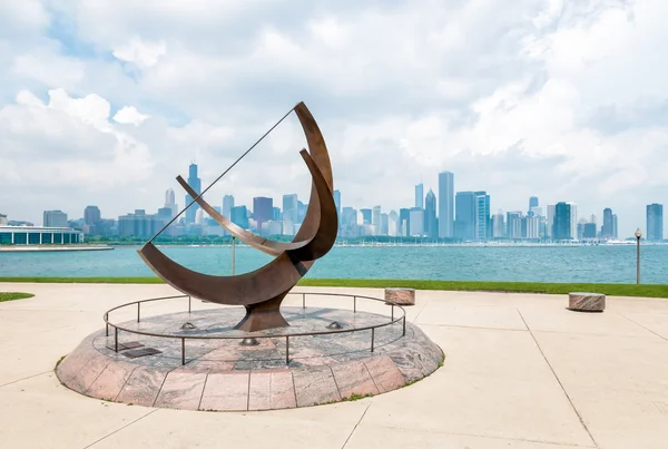 Bronze sculpture located on the Lake Michigan lakefront outside the Adler Planetarium.